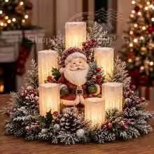 centro de mesa de natal com papai noel em resina e velas acesas