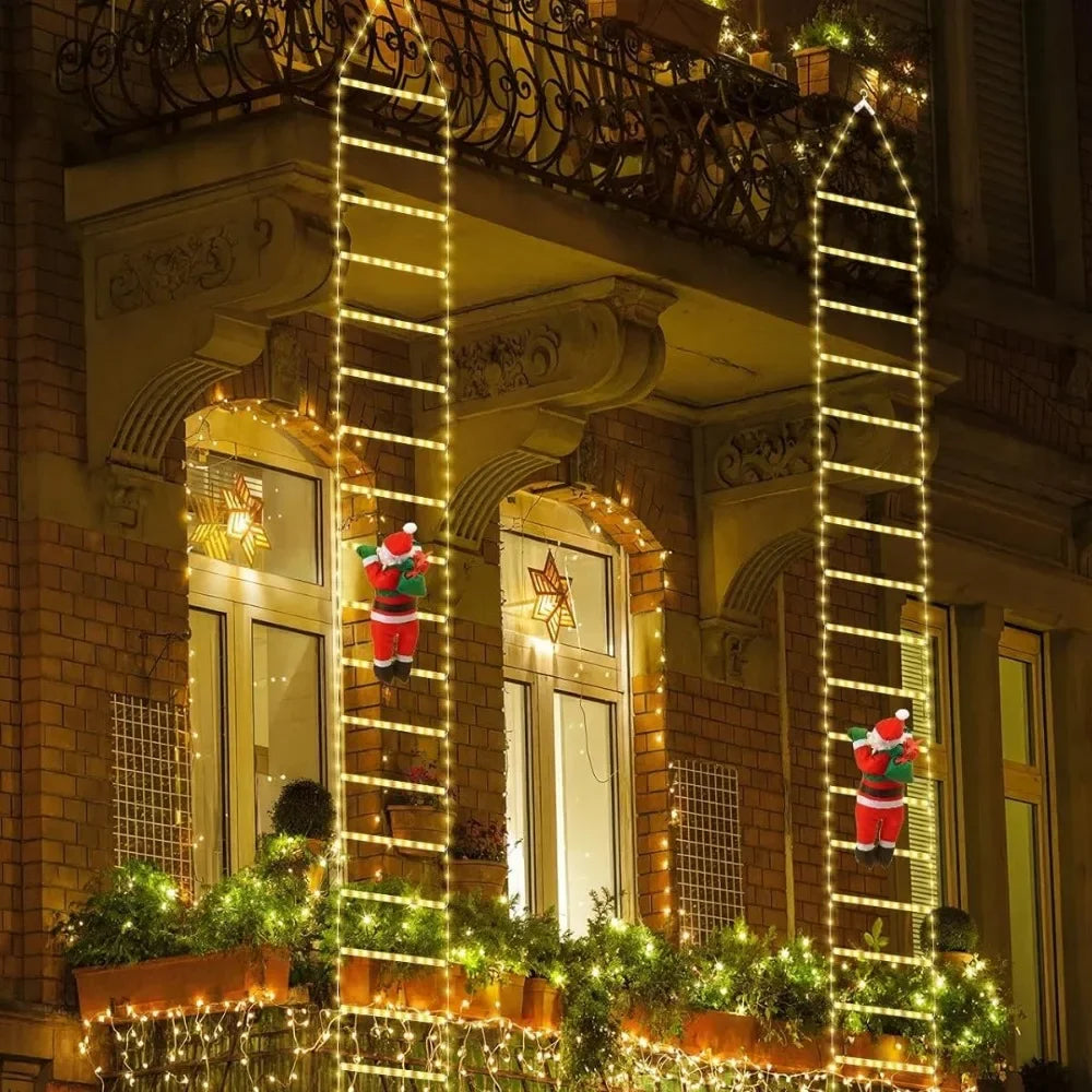 escadas de luz de natal com papai noel na fachada de prédio