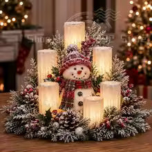 centro de mesa de natal com boneco de neve e folhagem nevada