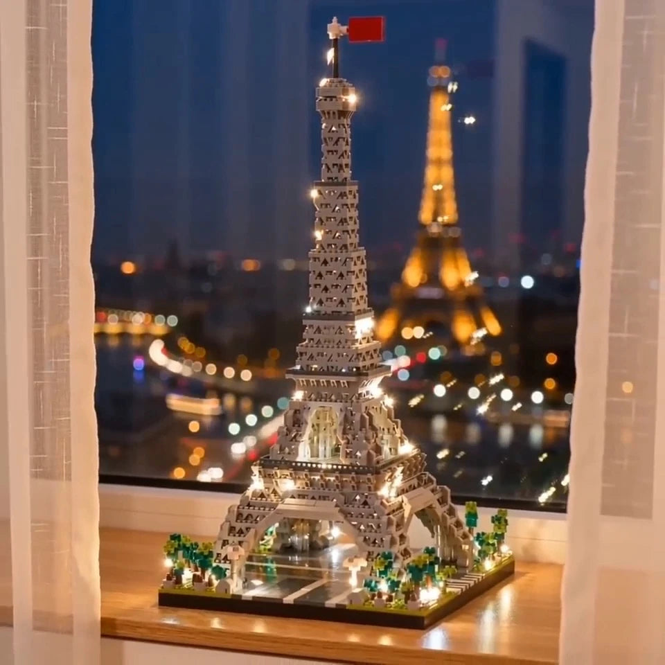 torre eiffel de blocos de montar com led na janela à noite