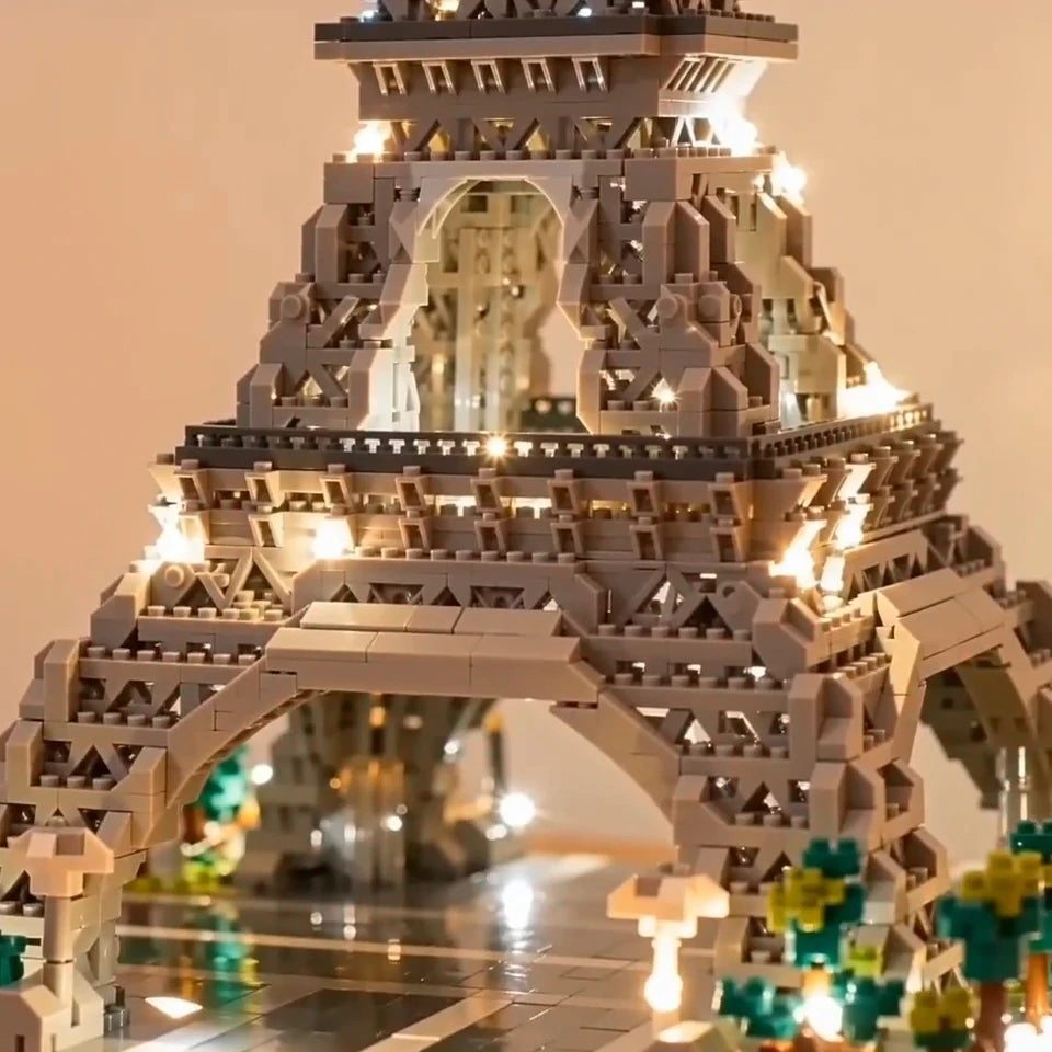 detalhe da base da torre eiffel de blocos micro iluminada