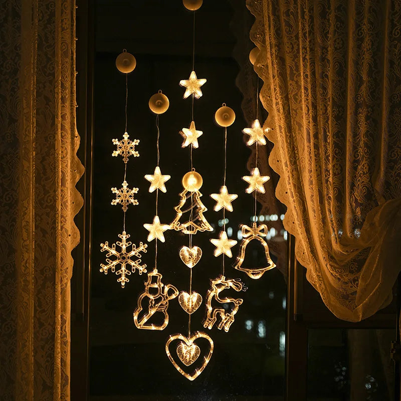 pendentes de natal iluminados com ventosa em janela com cortina de renda