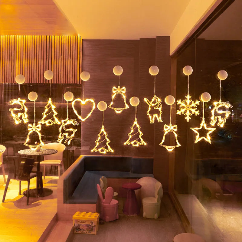 varios enfeites de janela de natal com led formando cortina de luz