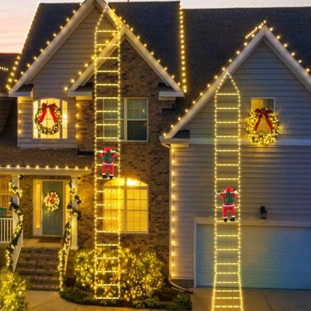 escada de luz de natal com papai noel escalando a fachada da casa