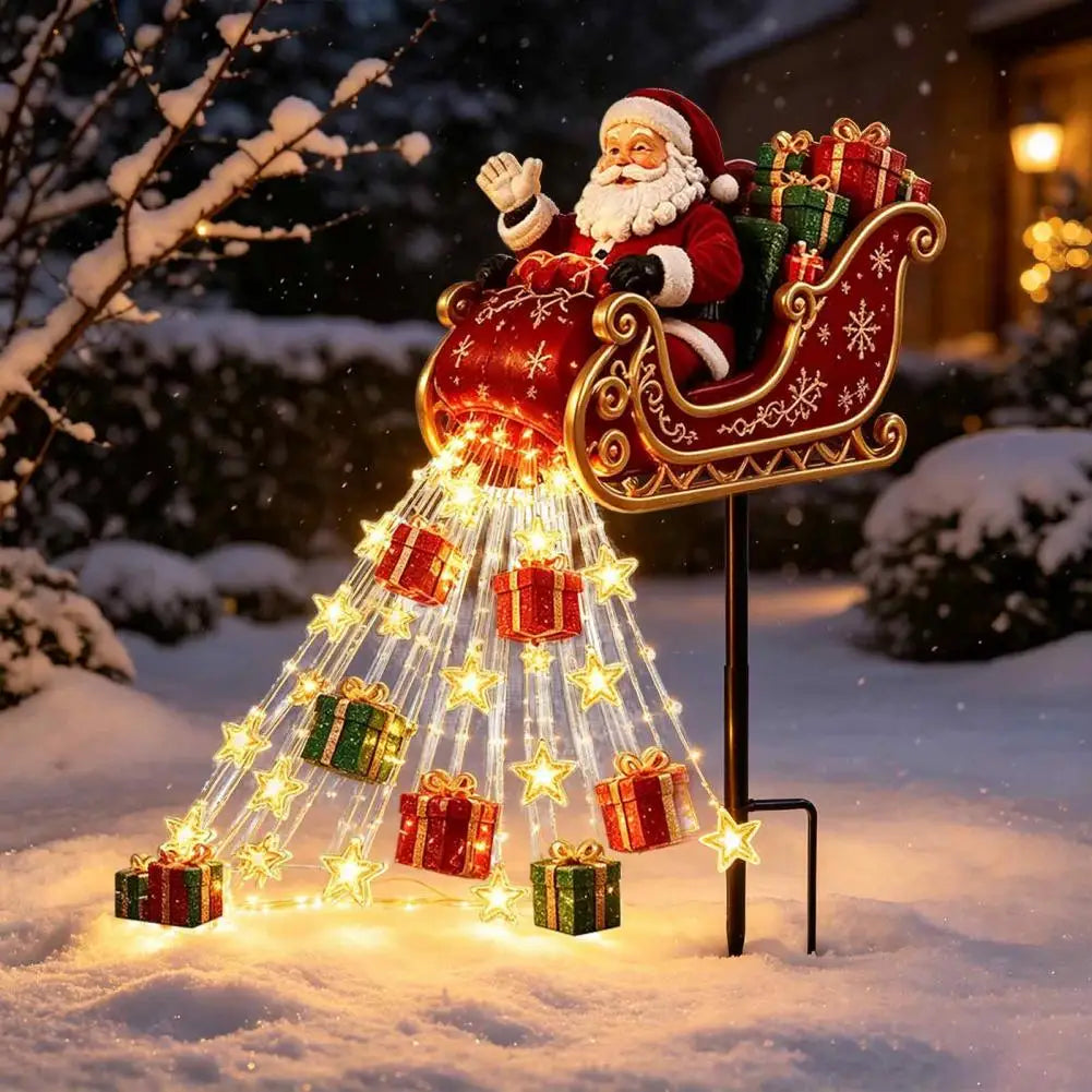 estaca solar de natal trenó do papai noel com cascata de estrelas iluminada no jardim com neve