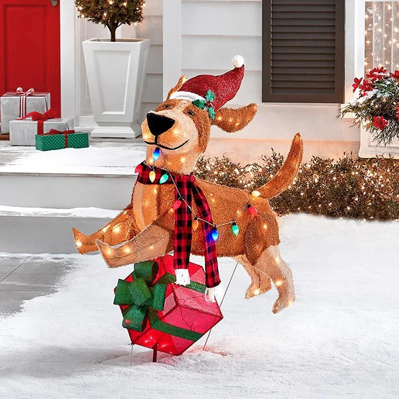 cachorro de natal iluminado com presente no jardim