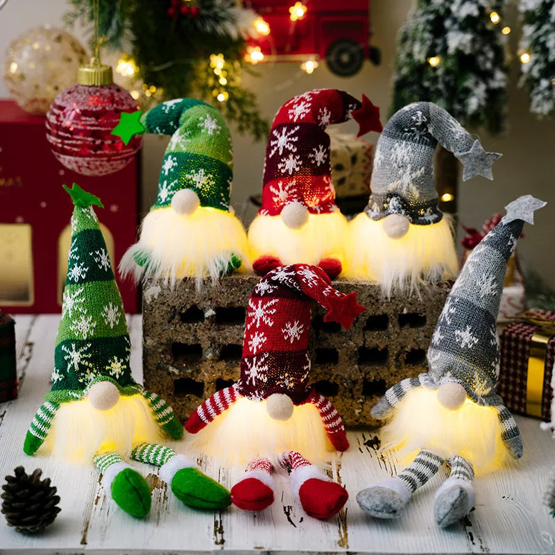 família de gnomos de natal com barba iluminada