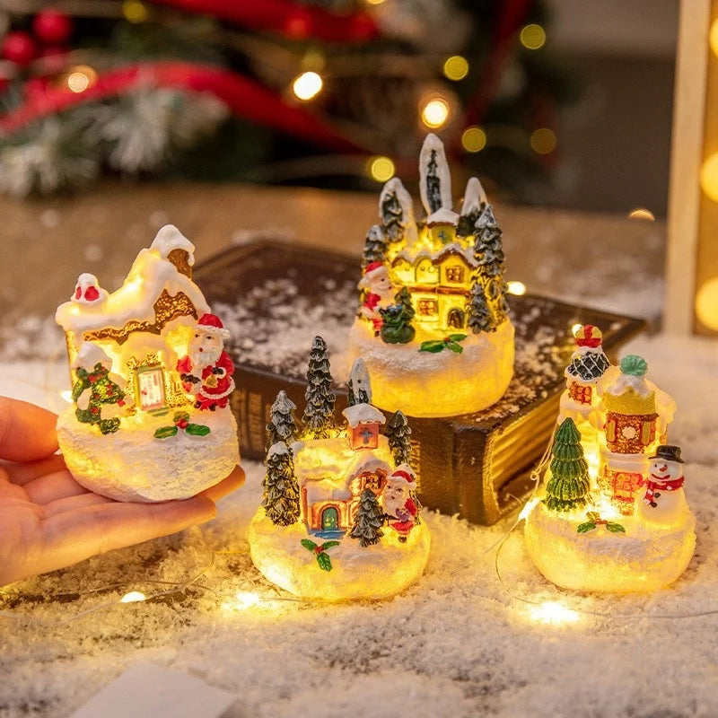 casinha de natal iluminada na palma da mão