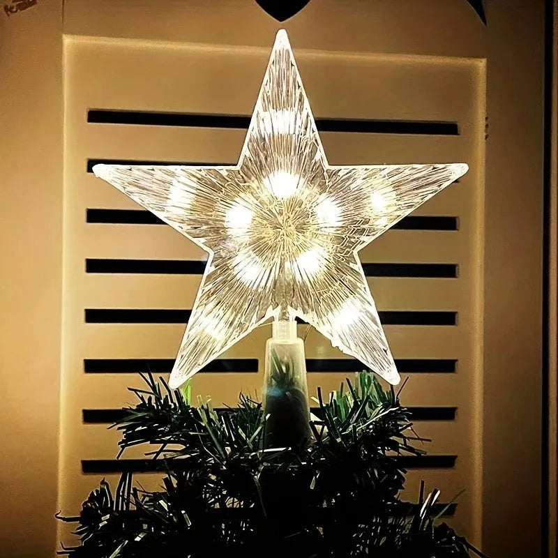 ponteira de arvore de natal estrela com led acesa no topo da arvore