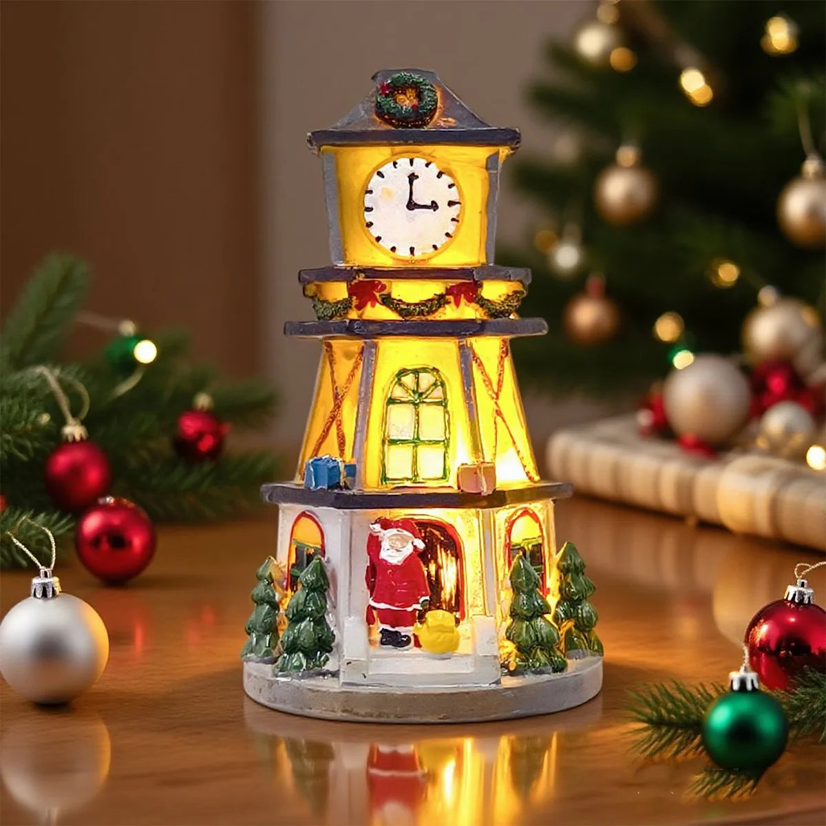 torre do relógio iluminada para vila de natal com papai noel na porta